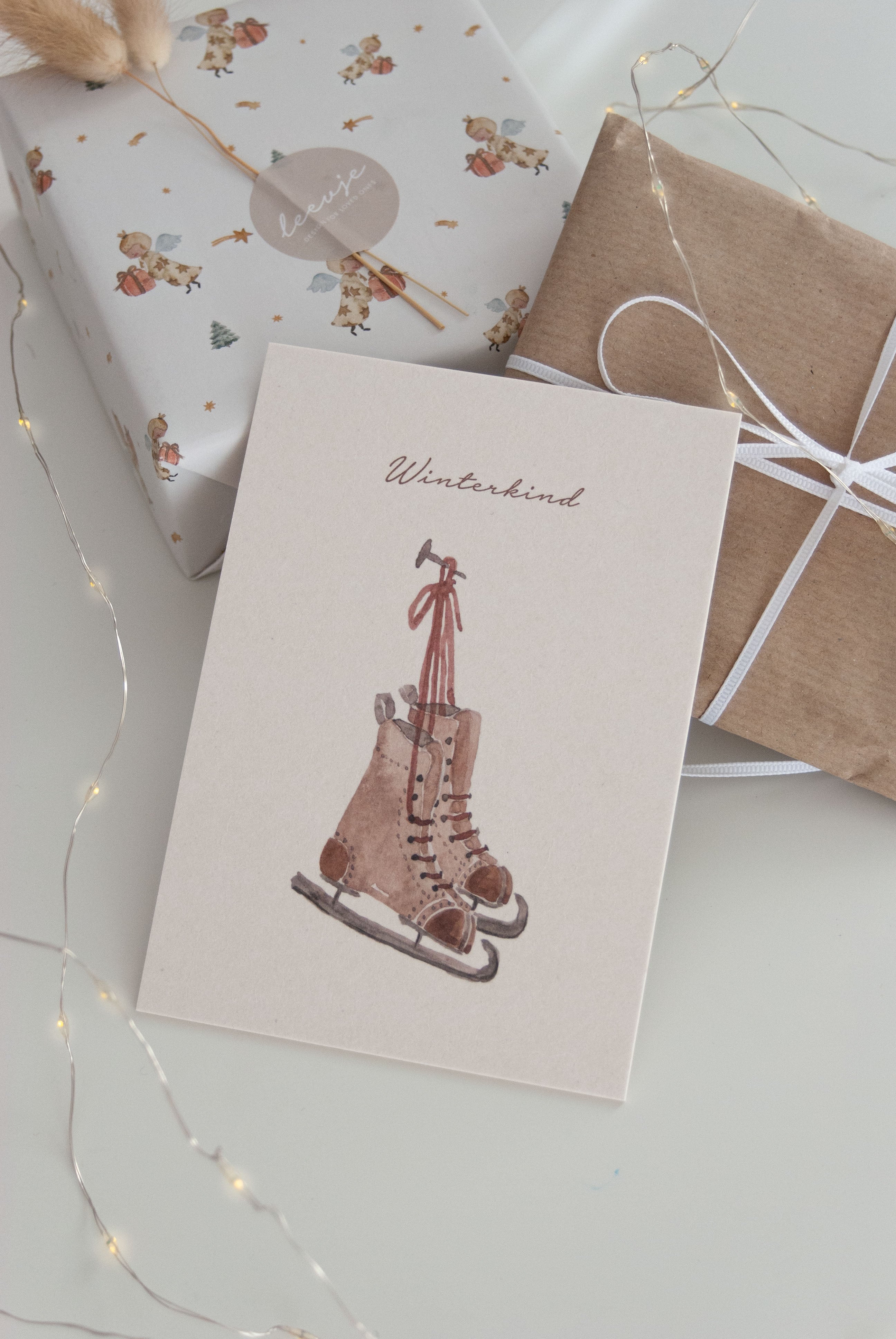 Ice skates "Winterkind" card made of wood pulp board