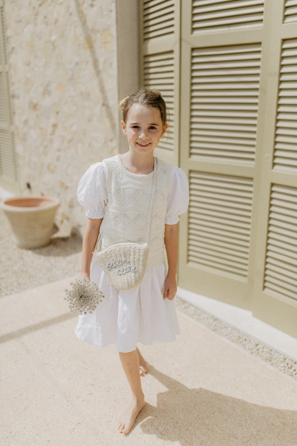 Knitted top with intricate lace pattern